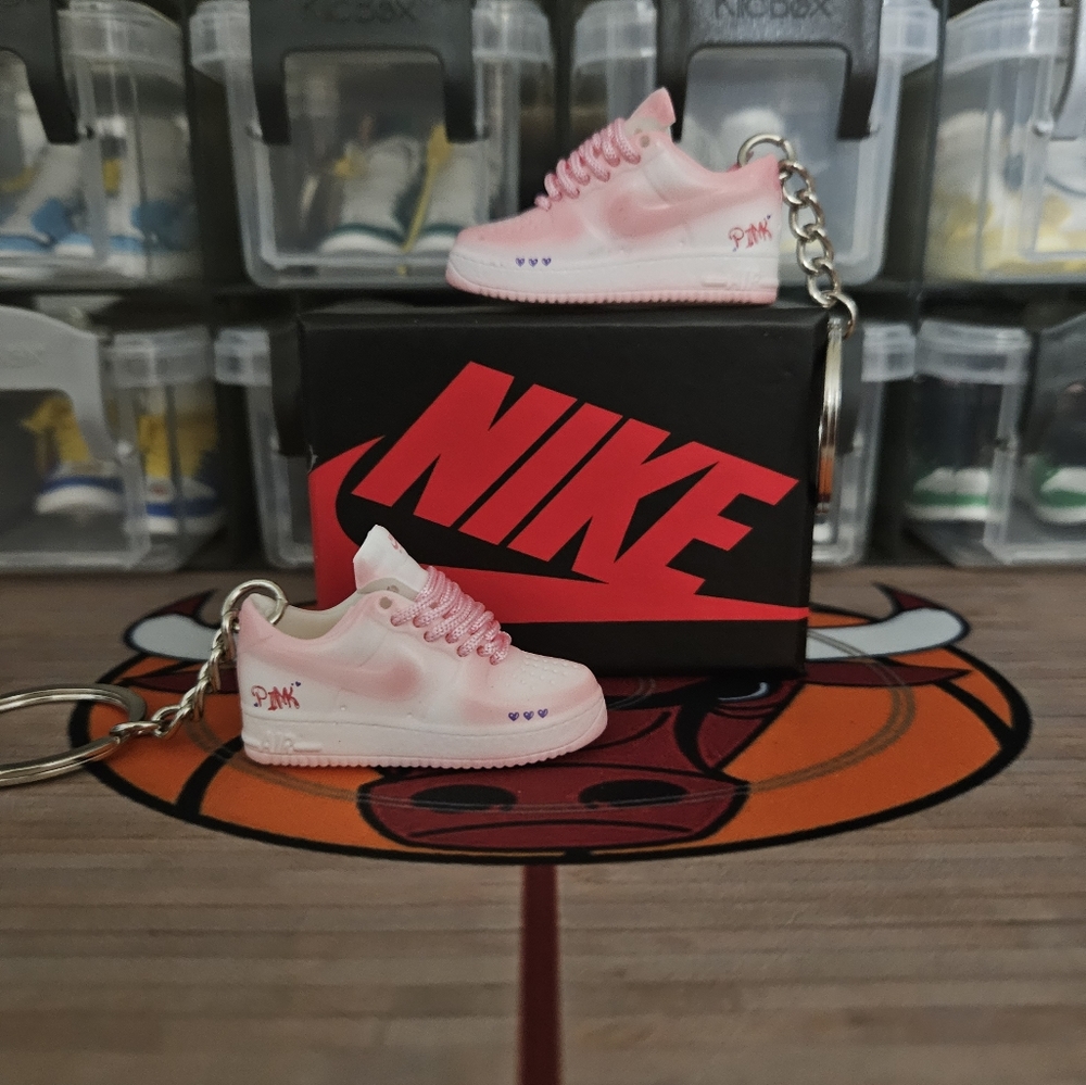 Nike Air Force 1 pair of mini sneakers keychain.